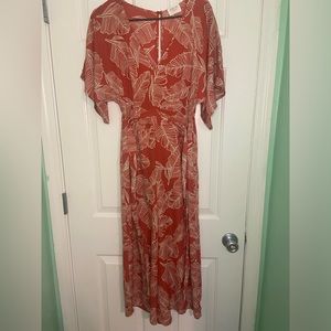 Women’s Burnt orange palm jumpsuit.